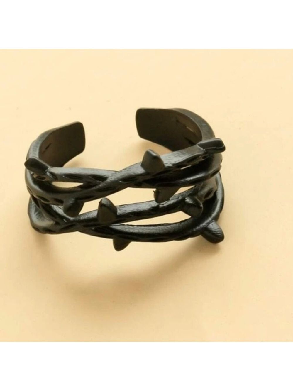 The Thorns wrapped thorn cuff ring